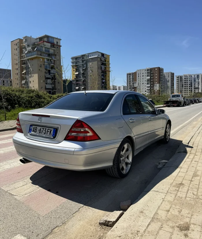 Rear view of silver Mercedes C-Class 2007 1.8 petrol automatic sedan with Albanian license plate