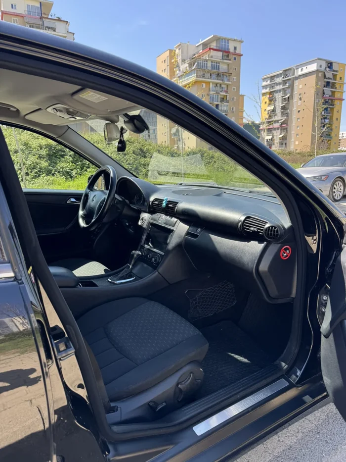 Front passenger seat and dashboard of Mercedes C-Class 2007 C220 diesel automatic sedan