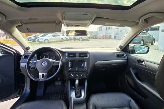 VW Jetta 2013 interior dashboard with automatic climate control and Bluetooth