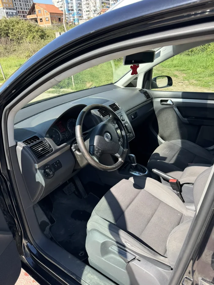 Interior of VW Touran automatic 7 seater rental in Tirana (2)