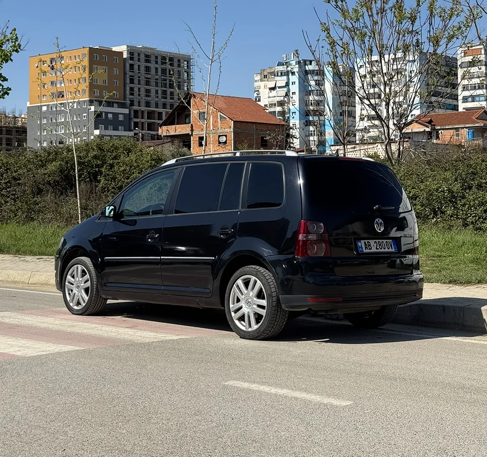 VW Touran 7 Seater – Car Rental Tirana | TiRental 10 - Car Rent in Albania Rear view of VW Touran 7 seater rental vehicle in Tirana (2)