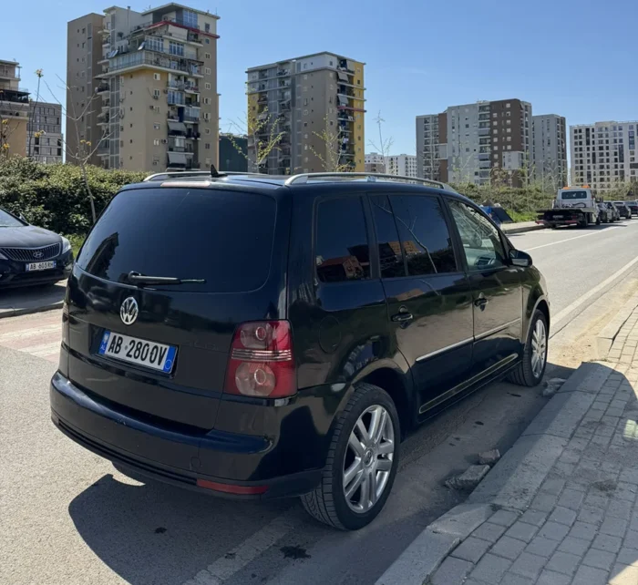 Rear view of VW Touran 7 seater rental vehicle in Tirana