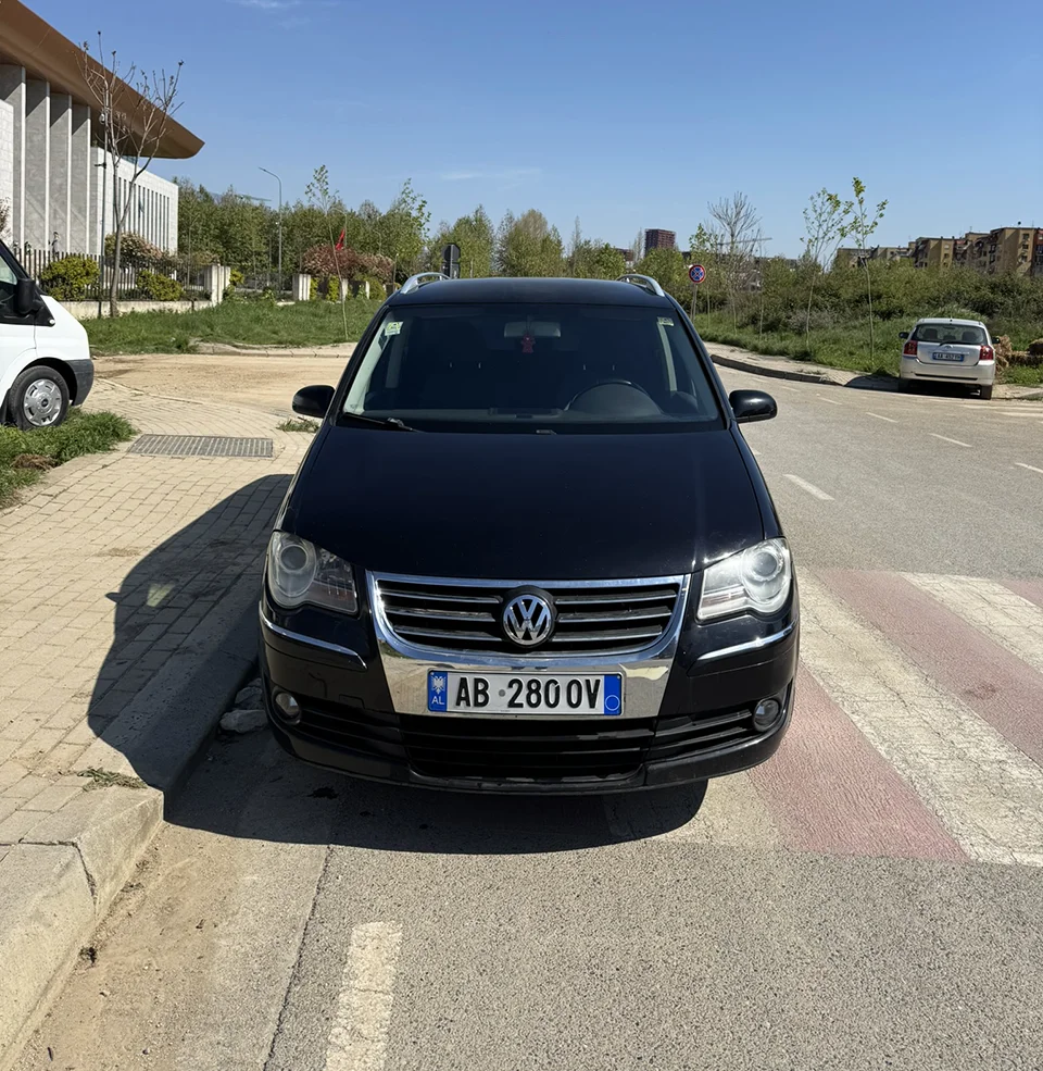 VW Touran 7 Seater – Car Rental Tirana | TiRental 9 - Car Rent in Albania VW Touran 7 seater car for rent in Albania on city road