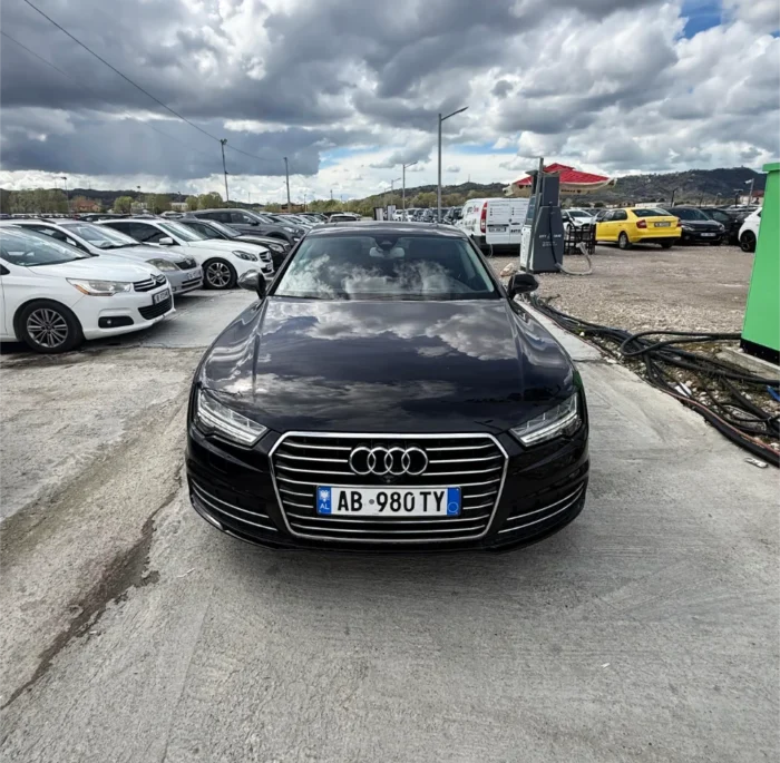 White Audi A7 2017 3.0 TDI diesel automatic luxury sedan with panoramic sunroof, parking sensors and reverse camera available for rent from TiRental in Albania