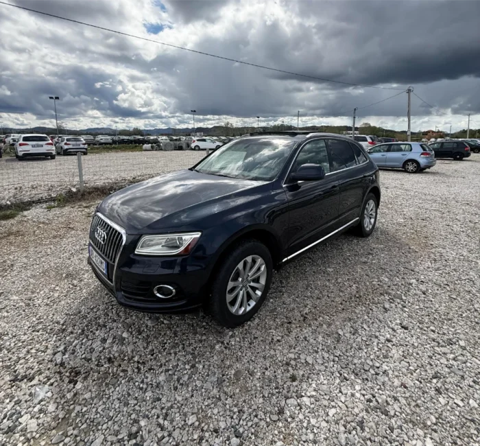 Black Audi Q5 2015 3.0 TDI diesel automatic premium SUV with panoramic sunroof and leather interior available for family car rental at Tirana Airport Albania