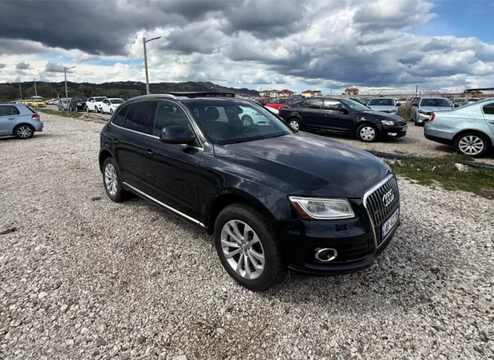 Black Audi Q5 2015 3.0 TDI diesel automatic premium SUV with panoramic sunroof and leather interior available for family car rental at Tirana Airport Albania