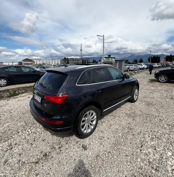 Black Audi Q5 2015 3.0 TDI diesel automatic premium SUV with panoramic sunroof and leather interior available for family car rental at Tirana Airport Albania