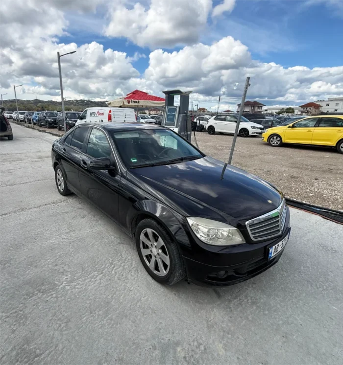 Black Mercedes-Benz C-Class 2010 C220 CDI 2.2 diesel automatic premium sedan available for business car rental at Tirana Airport Albania