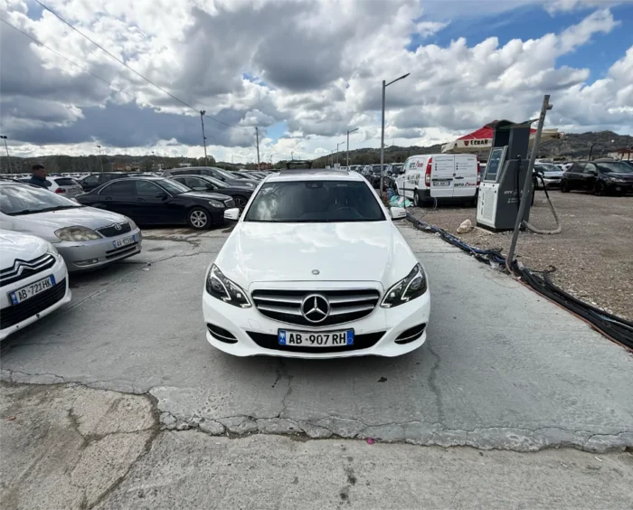 Mercedes E‑Class 2016 2.0 diesel automatic rental car with sunroof and air‑conditioning available in Tirana and at Tirana International Airport Rinas