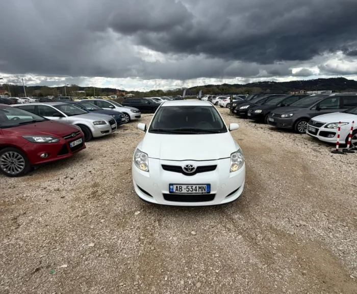 White Toyota Auris 2010 1.4 diesel manual hatchback rental car available from TiRental in Albania