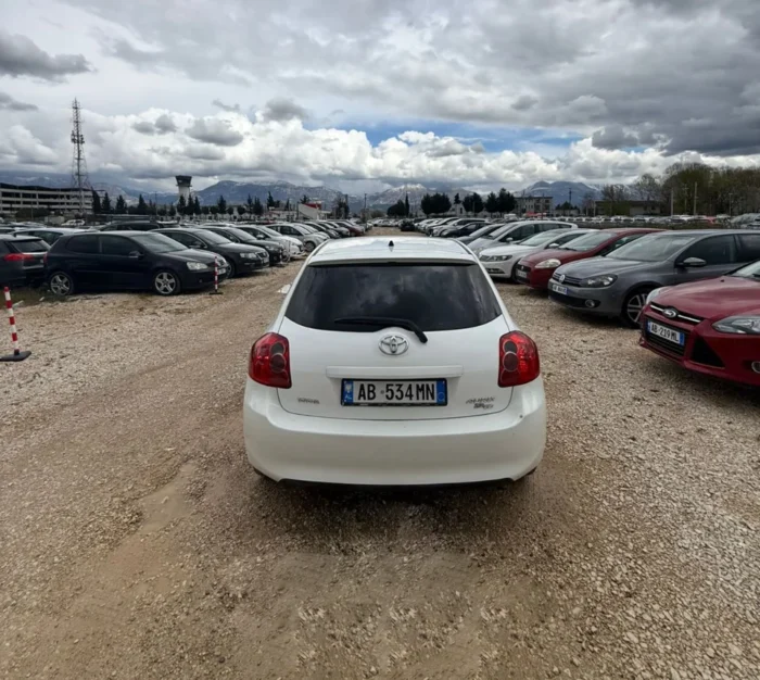 White Toyota Auris 2010 1.4 diesel manual hatchback rental car available from TiRental in Albania