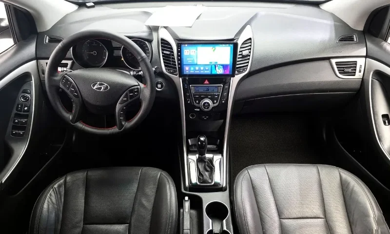 Hyundai i30 2013 – 1.6 Diesel Automatic Hatchback Rental in Tirana Albania 50 - Car Rent in Albania White Hyundai i30 2013 1.6 diesel automatic five‑door hatchback with alloy wheels, available for car rental in Tirana Albania from TiRental