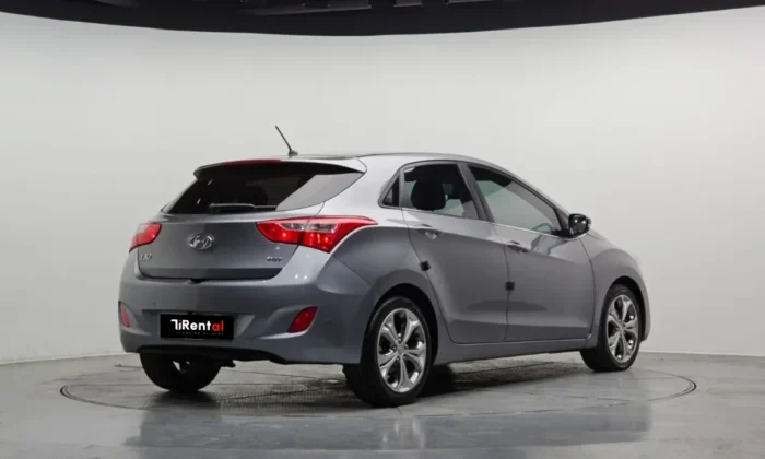 Silver Hyundai i30 1.6 diesel automatic five‑door hatchback parked in a studio, available for car rental in Tirana Albania with TiRental