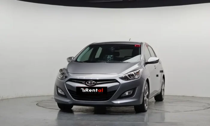 Silver Hyundai i30 1.6 diesel automatic five‑door hatchback parked in a studio, available for car rental in Tirana Albania with TiRental
