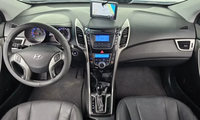 Silver Hyundai i30 1.6 diesel automatic five‑door hatchback parked in a studio, available for car rental in Tirana Albania with TiRental