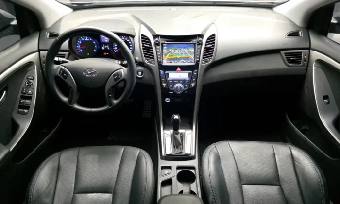 Silver Hyundai i30 1.6 diesel automatic five‑door hatchback parked in a studio, available for car rental in Tirana Albania with TiRental
