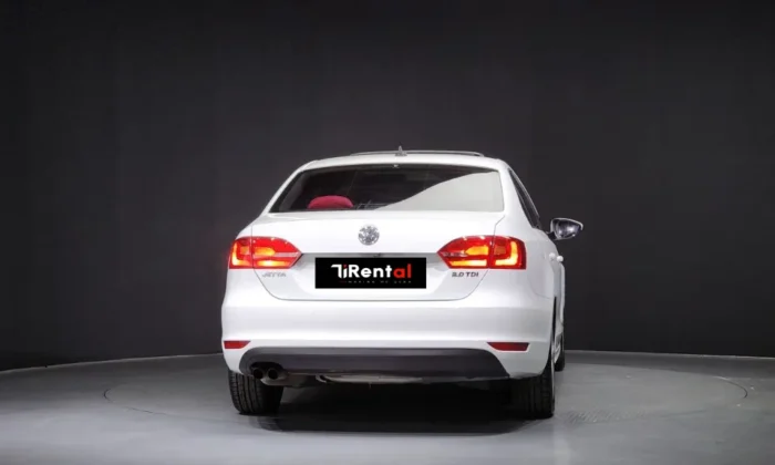 White Volkswagen Jetta 2014 2.0 TDI diesel automatic sedan with sunroof and TiRental branding, available for car rental in Tirana Albania